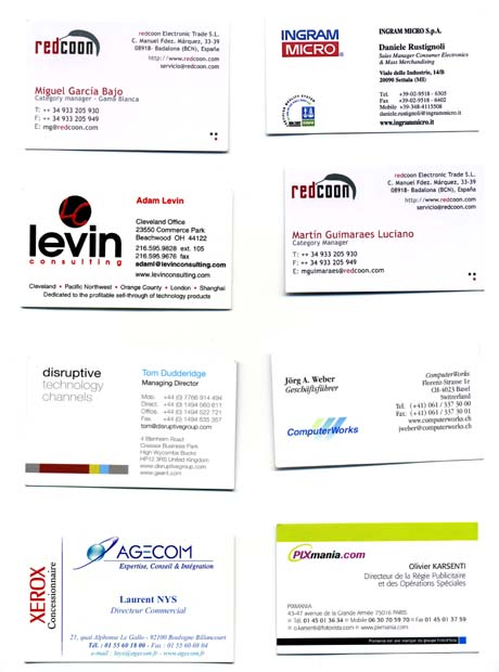 Segmentation of several business card images on a white background